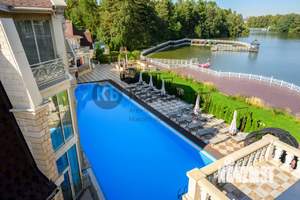 Коттедж 2160м², 3-этажный, участок 38 сот.  